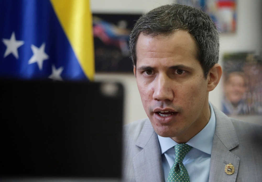 Handout picture released by the press office of opposition leader Juan Guaido showing Guaido taking part in a virtual meeting with members of the old Parliament, elected in 2015, in Caracas on December 30, 2022. Photo by Leo Alvarez / Juan Guaido's Photography service / AFP