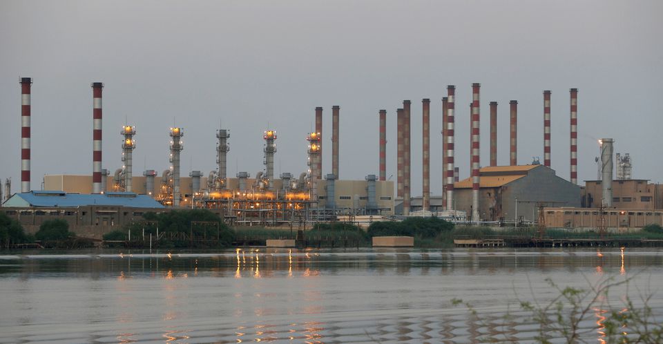 A general view of Abadan oil refinery in southwest Iran, is pictured from Iraqi side of Shatt al-Arab in Al-Faw south of Basra, Iraq, on September 21, 2019.  File Photo / Reuters
