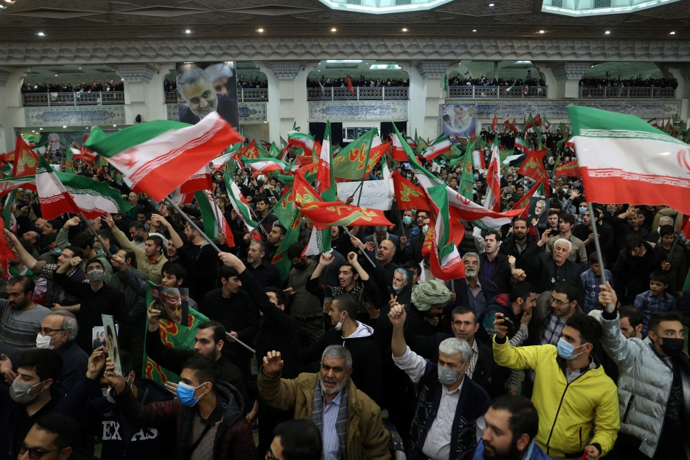 People attend the ceremony to mark the third anniversary of the killing of senior Iranian military commander General Qassem Soleimani in a US attack, in Tehran, Iran, January 3, 2023. Majid Asgaripour/WANA (West Asia News Agency) via REUTERS 