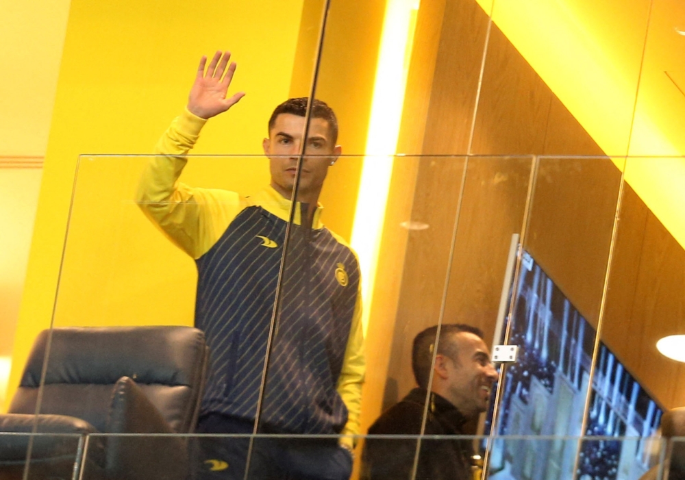 Al Nassr's Cristiano Ronaldo acknowledges the fans inside the stadium before the Al Nassr v Al Tai match at Mrsool Park, Riyadh, Saudi Arabia, January 6, 2023. (REUTERS/Ahmed Yosri)