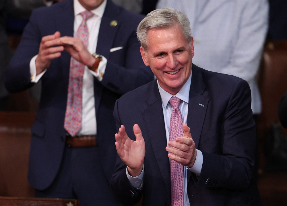 US House Republican Leader Kevin McCarthy (R-CA) celebrates after being elected Speaker of the House in the House Chamber at the U.S. Capitol Building on January 07, 2023 in Washington, DC. Win McNamee/Getty Images/AFP 