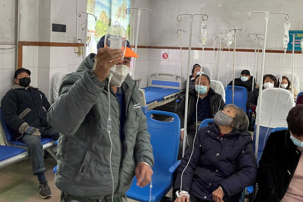 Patients receive IV drip treatment at a hospital, amid the coronavirus disease (Covid-19) outbreak, at a village in Tonglu county, Zhejiang province, China, January 9, 2023. (REUTERS)