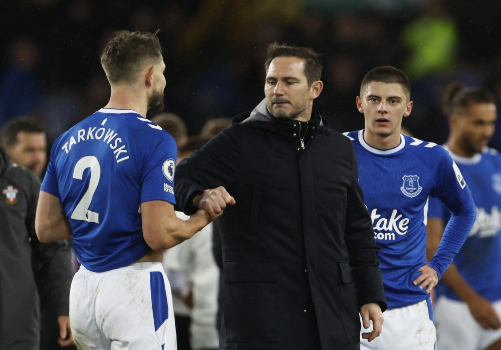 Everton's James Tarkowski and manager Frank Lampard look dejected after the Premier League match against Southampton at Goodison Park, Liverpool, Britain on January 14, 2023. Action Images via Reuters/Jason Cairnduff 