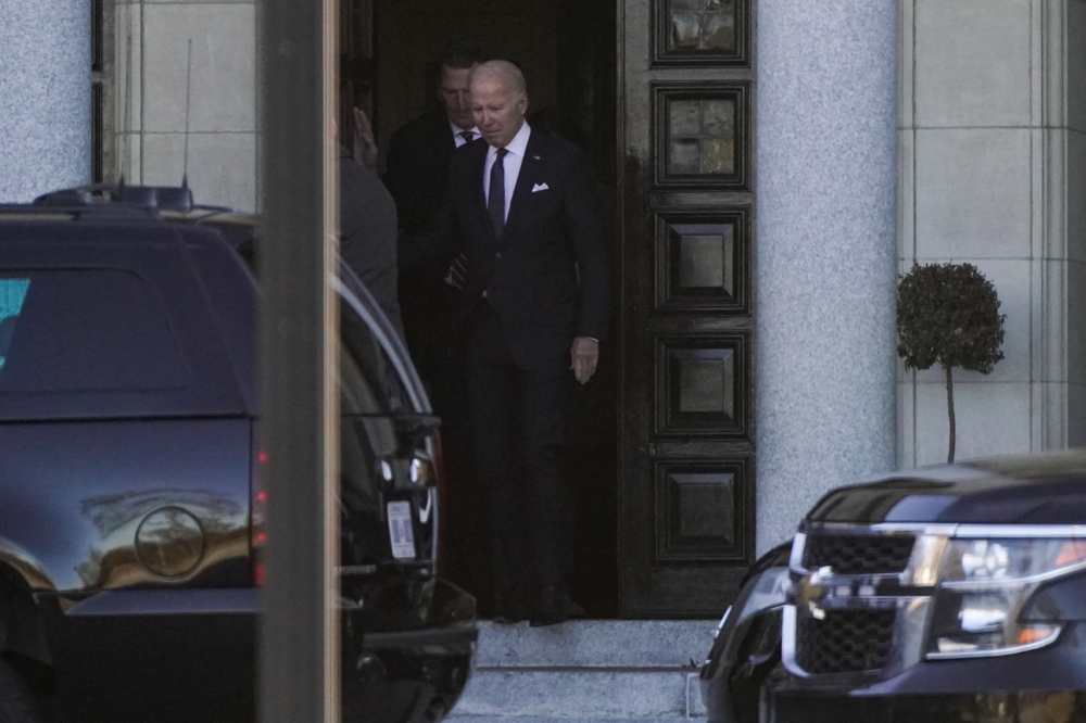 US President Joe Biden departs after attending a viewing during a memorial service at St. Elizabeth's Catholic Church in Wilmington, Delaware, US, on January 16, 2023. REUTERS/Joshua Robert