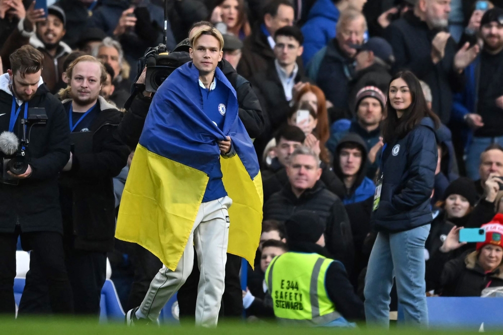File Photo: Chelsea's new signing, Chelsea's Ukrainian midfielder Mykhailo Mudryk is introduced to the crowd at half-time in the English Premier League football match between Chelsea and Crystal Palace at Stamford Bridge in London on January 15, 2023. (Photo by Ben Stansall / AFP)

