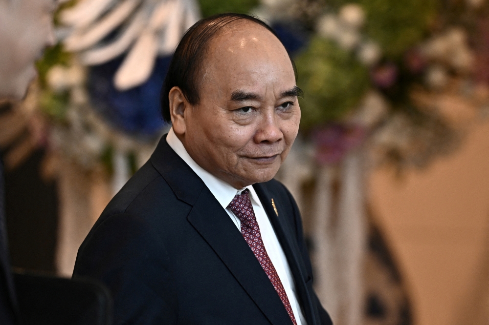 Vietnam's President Nguyen Xuan Phuc arrives to attend APEC Leader's Dialogue with APEC Business Advisory Council during the Asia-Pacific Economic Cooperation (APEC) summit, November 18, 2022, in Bangkok, Thailand. (Lillian Suwanrumpha/Pool via REUTERS)