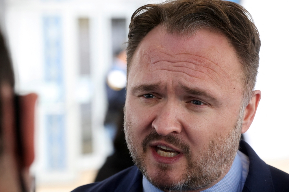 Denmark's Climate Minister Dan Jorgensen speaks to the media after a meeting at the UN Climate Change Conference (COP26) in Glasgow, Scotland, Britain, November 11, 2021. (REUTERS/Yves Herman)