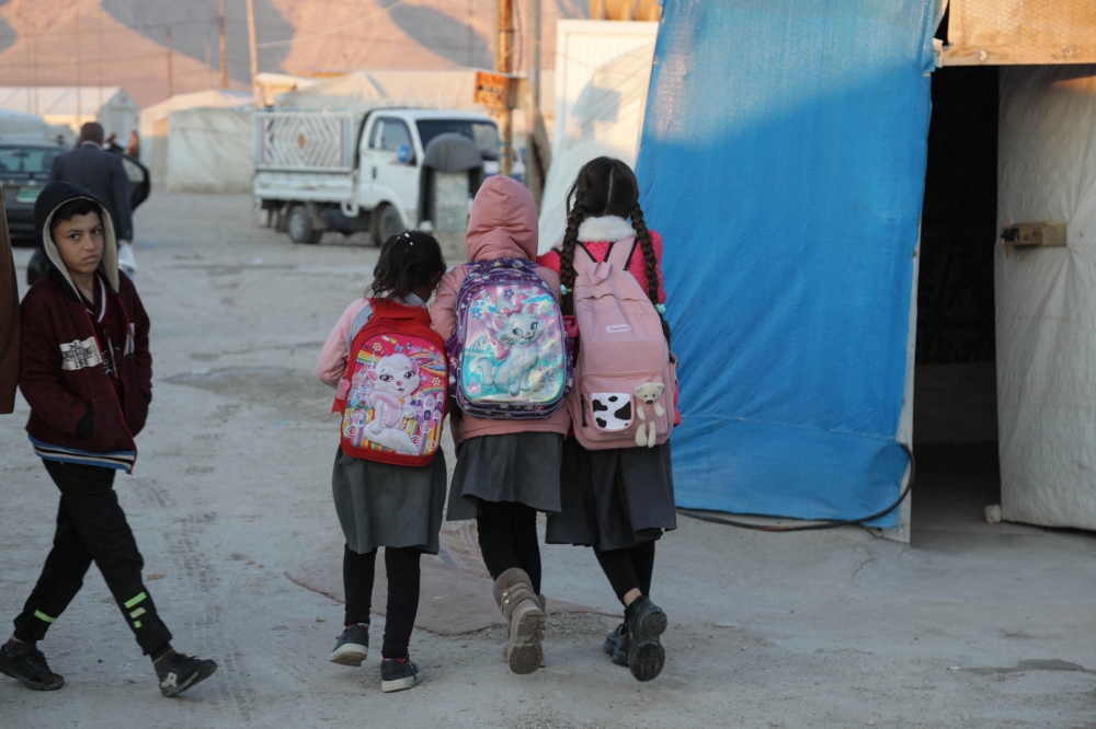 Displaced Iraqis from the Yazidi community are pictured at a camp for internally displaced persons (IDP) in the Sharya area, some 15 kms from the northern city of Dohuk in the autonomous Iraqi Kurdistan region, on January 17, 2023. (Photo by SAFIN HAMED / AFP)