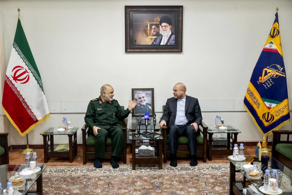 A handout picture provided by the Islamic Consultative Assembly News Agency (ICANA) on January 21, 2023, shows Iranian parliament speaker Mohammad Bagher Ghalibaf (right) meeting with the Islamic Revolutionary Guard Corps (IRGC) chief Hossein Salami, in the capital Tehran. (Photo by ICANA NEWS AGENCY / AFP)