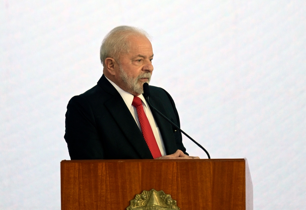 Brazil's President Luiz Inacio Lula da Silva, speaks after signing a bill recognising community health agents and agents fighting endemic diseases as health professionals, with regulated professions, at an event at the Palacio do Planalto, in Brasilia, on January 20, 2023. (Photo by DOUGLAS MAGNO / AFP)