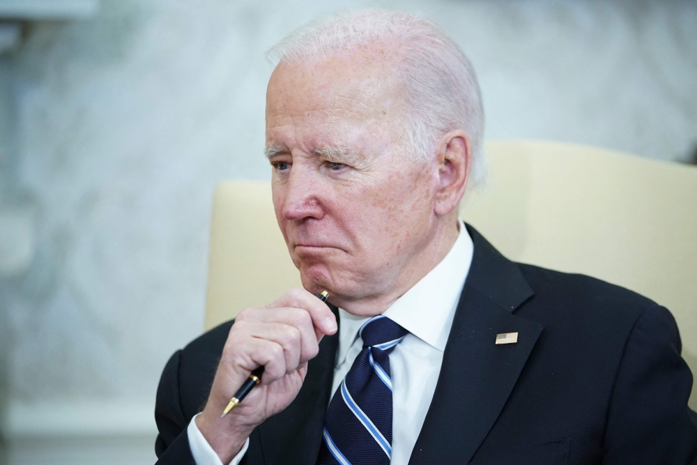 (Files) In this file photo taken on January 13, 2023, US President Joe Biden (R) listens to Japanese Prime Minister Fumio Kishida speak in the Oval Office of the White House in Washington, DC. (Photo by Mandel Ngan / AFP)