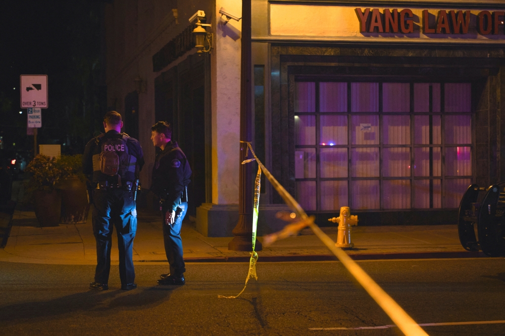 Police respond to a shooting with multiple casualties in the Monterey Park area of Los Angeles, California, U.S. January 21, 2023. REUTERS/Allison Dinner