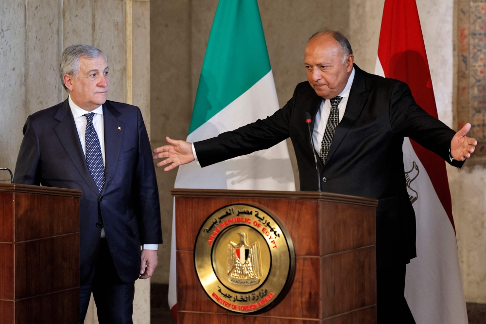 Italy's Foreign Minister Antonio Tajani (left) and his Egyptian counterpart Sameh Shoukry give a joint press conference in Egypt's capital Cairo on January 22, 2023. (Photo by Khaled Desouki / AFP)