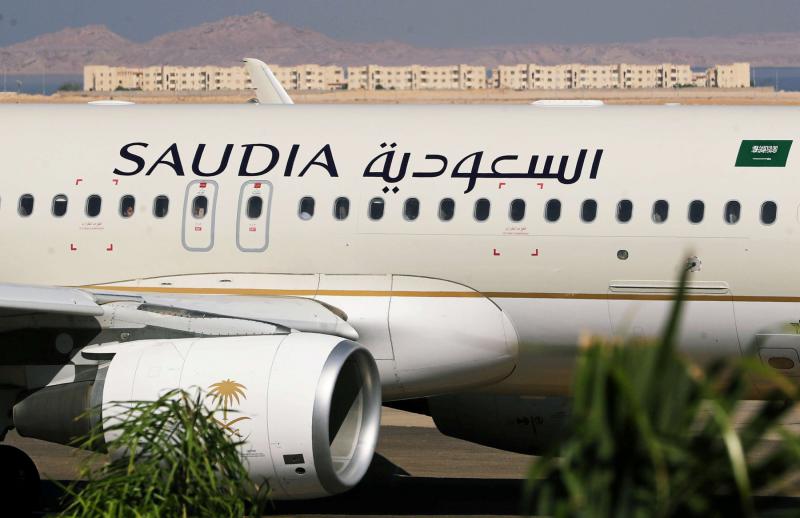 Saudia Airlines plane, is seen at the airport of the Red Sea resort of Sharm el-Sheikh, Egypt, August 9, 2021. Picture taken through a window. REUTERS/Mohamed Abd El Ghany.
