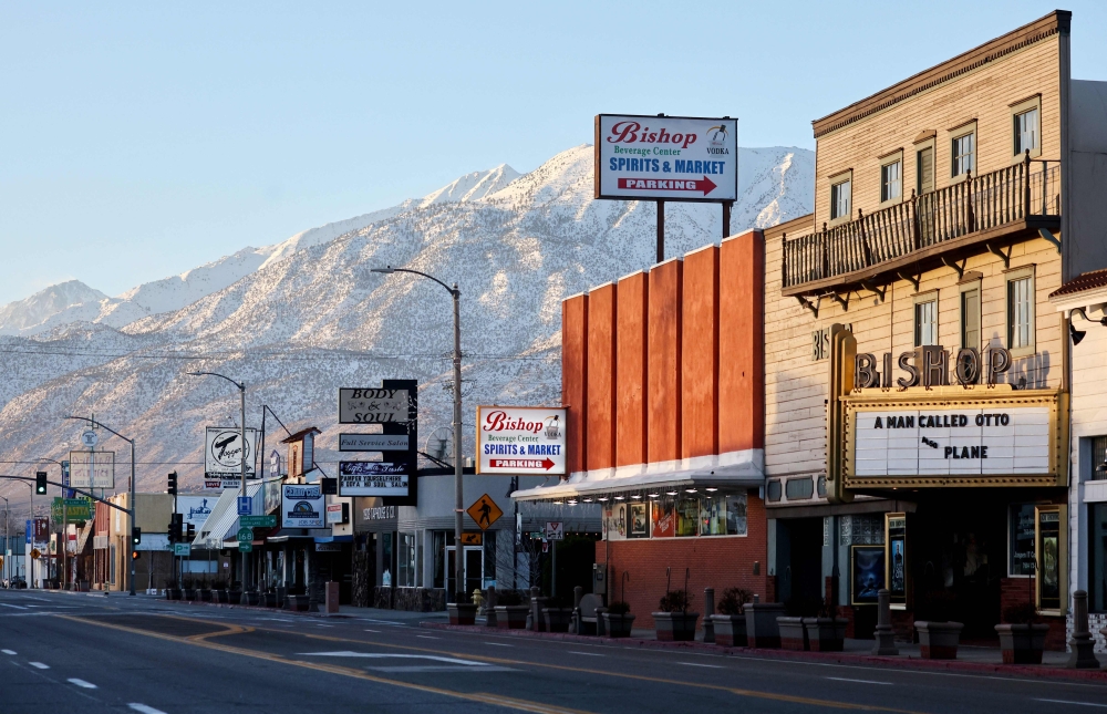 The rising sun illuminates downtown and the snow-covered Sierra Nevada mountains after a series of atmospheric river storms brought heavy snowfall to the mountain range on January 22, 2023 in Bishop, California. (Mario Tama/Getty Images/AFP)