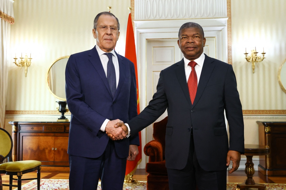 Russian Foreign Minister Sergei Lavrov meets with Angola's President Joao Lourenco in Luanda on January 25, 2023. (Photo by Handout / RUSSIAN FOREIGN MINISTRY / AFP)