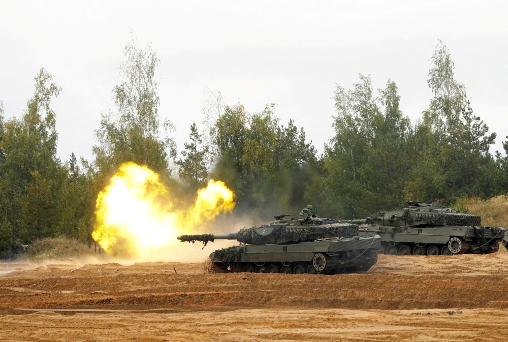 File Photo: NATO enhanced Forward Presence battle group Spanish army tank Leopard 2 fires during the final phase of the Silver Arrow 2022 military drill on Adazi military training grounds, Latvia, September 29, 2022. (REUTERS/Ints Kalnins)