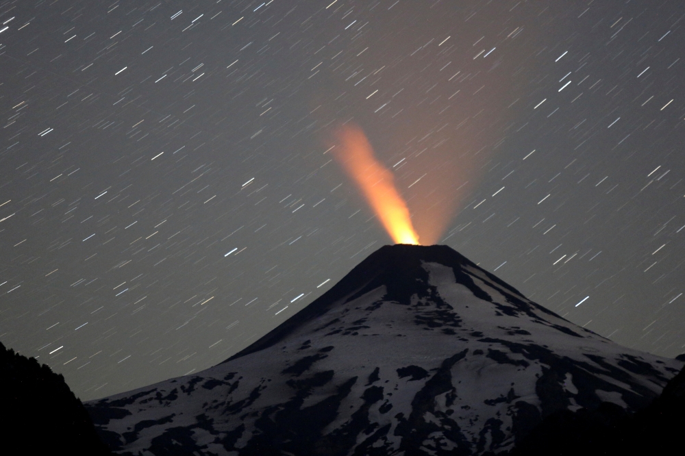 A general view of the Villarrica volcano from Pucon area, Chile on January 28, 2023. Picture taken using long exposure. REUTERS/Cristobal Saavedra Escobar