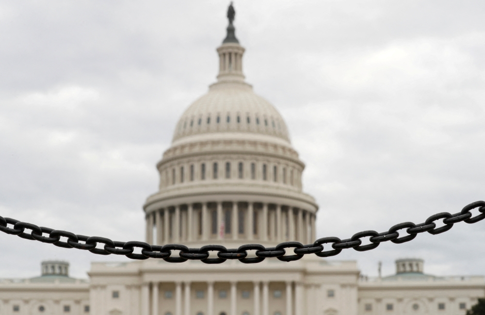  The dome of the US Capitol is seen beyond a chain fence during the partial government shutdown in Washington, US, on January 8, 2019. File Photo / Reuters