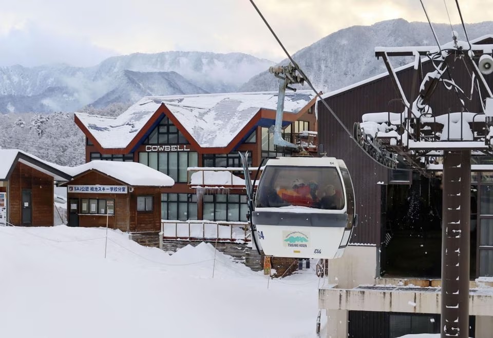Rescue workers ride a gondola at a ski resort as they take part in a search for missing skiers following an avalanche the previous day, in the village of Otari in Nagano Prefecture, central Japan, Jannuary 30, 2023, in this photo taken by Kyodo. Mandatory credit Kyodo via REUTERS