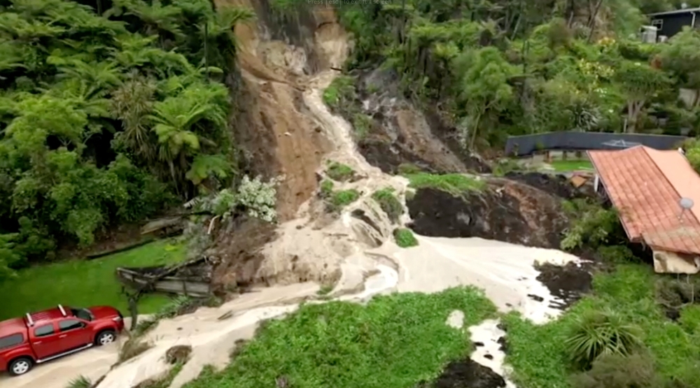 General view of the area where a landslide occurred due to flooding, in Auckland, New Zealand, January 30, 2023 in this screen grab obtained from a video. Newshub/via Reuters TV/Handout via REUTERS