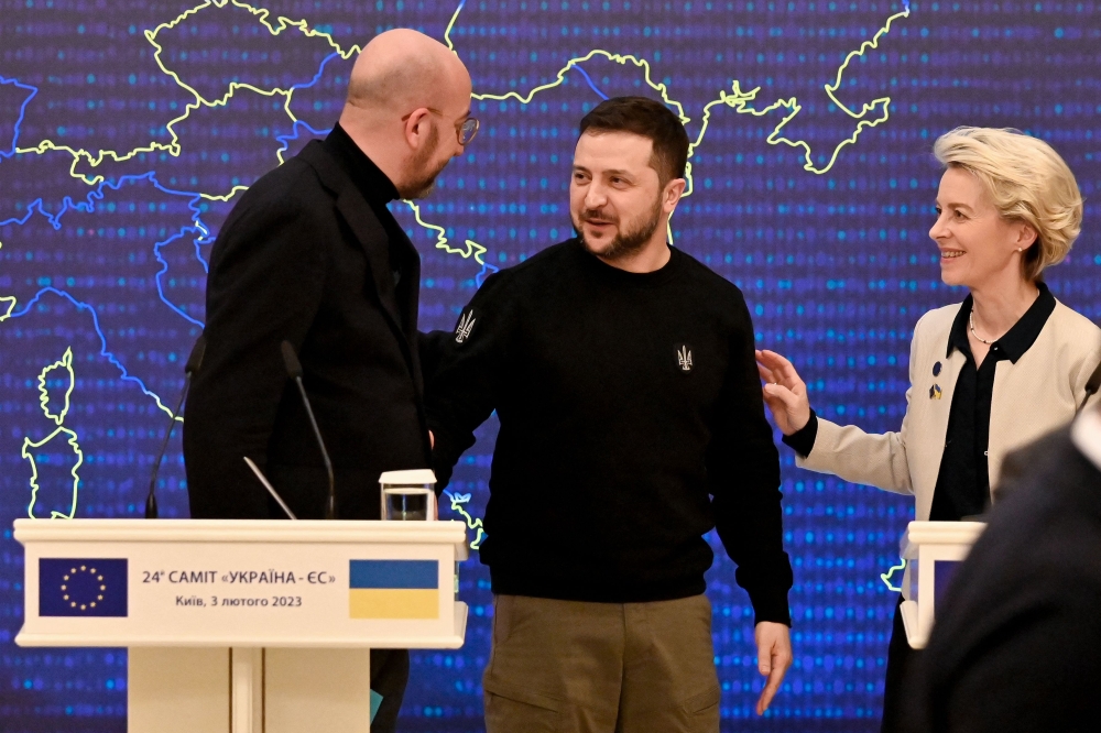 Ukrainian President Volodymyr Zelensky (C), President of the European Commission Ursula von der Leyen (R) and European Council President Charles Michel (L) speak at the end of a joint press conference during an EU-Ukraine summit in Kyiv on February 3, 2023