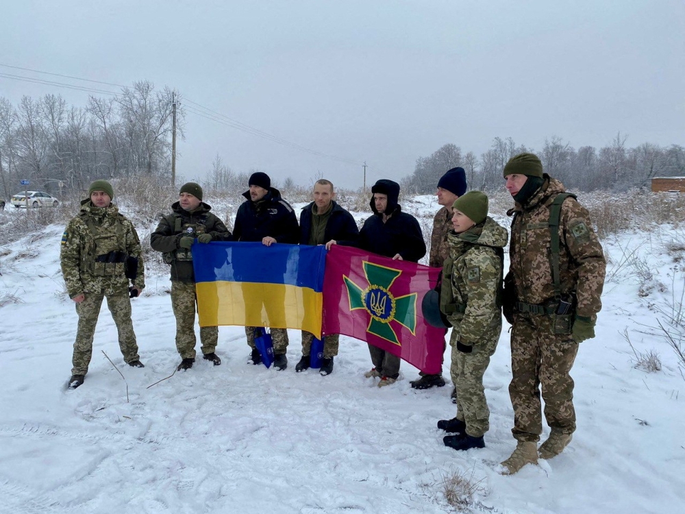 Ukrainian prisoners of war (POWs) pose for a picture after a swap, amid Russia's attack on Ukraine, in an unknown location, Ukraine, in this handout picture released on February 4, 2023. Press Service of the General Staff of the Ukrainian Armed Forces/Handout via REUTERS