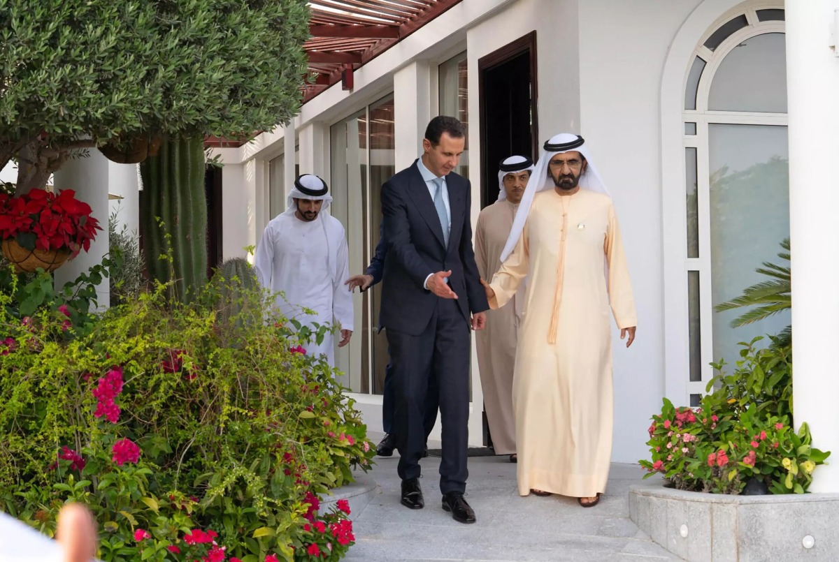 Syria's President Bashar al-Assad with the UAE's Vice President and Prime Minister Sheikh Mohammed bin Rashid Al-Maktoum during the Syrian president's visit to the UAE on March 18, 2022. File photo /Syrian Presidency Facebook page/AFP