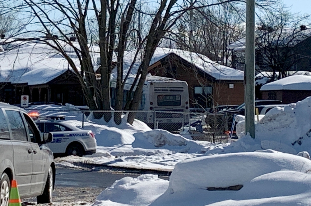 Laval, Canada, Police secure the scene where a city bus (C) crashed into a day care center on February 8, 2023. Photo by Anne-Sophie THILL / AFP
