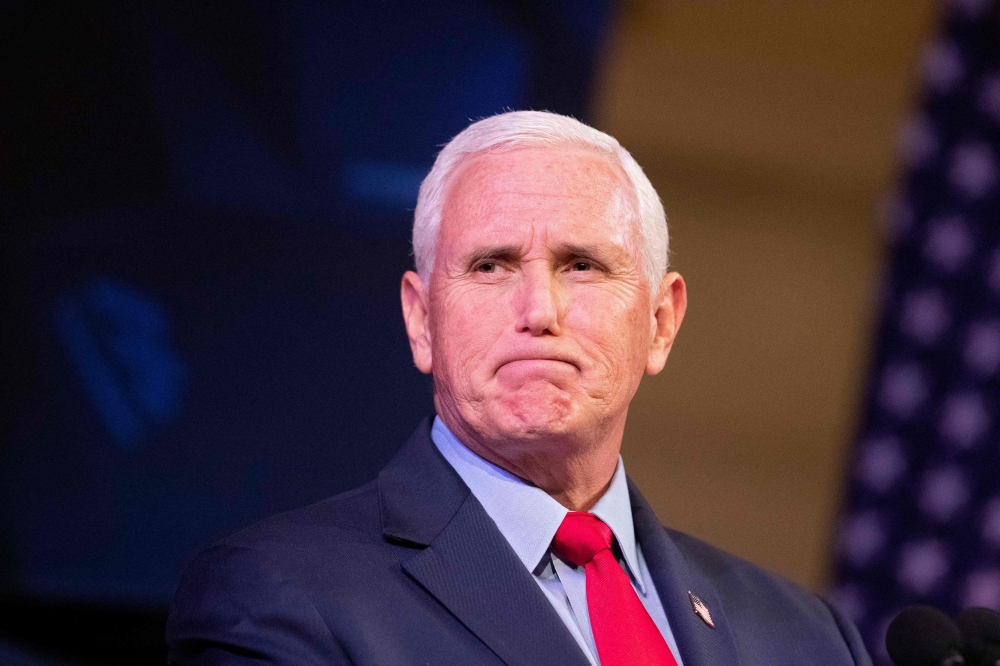 In this file photo taken on April 12, 2022 former US Vice President Mike Pence speaks at a campus lecture hosted by Young Americans for Freedom at the University of Virginia in Charlottesville, Virginia.  (Photo by Ryan M. Kelly / AFP)