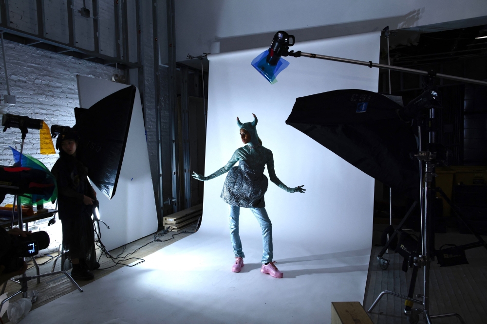 A model poses for pictures backstage before the Collina Strada show during York Fasion Week (NYFW) in New York on February 10, 2023.(Photo by Kena Betancur / AFP)