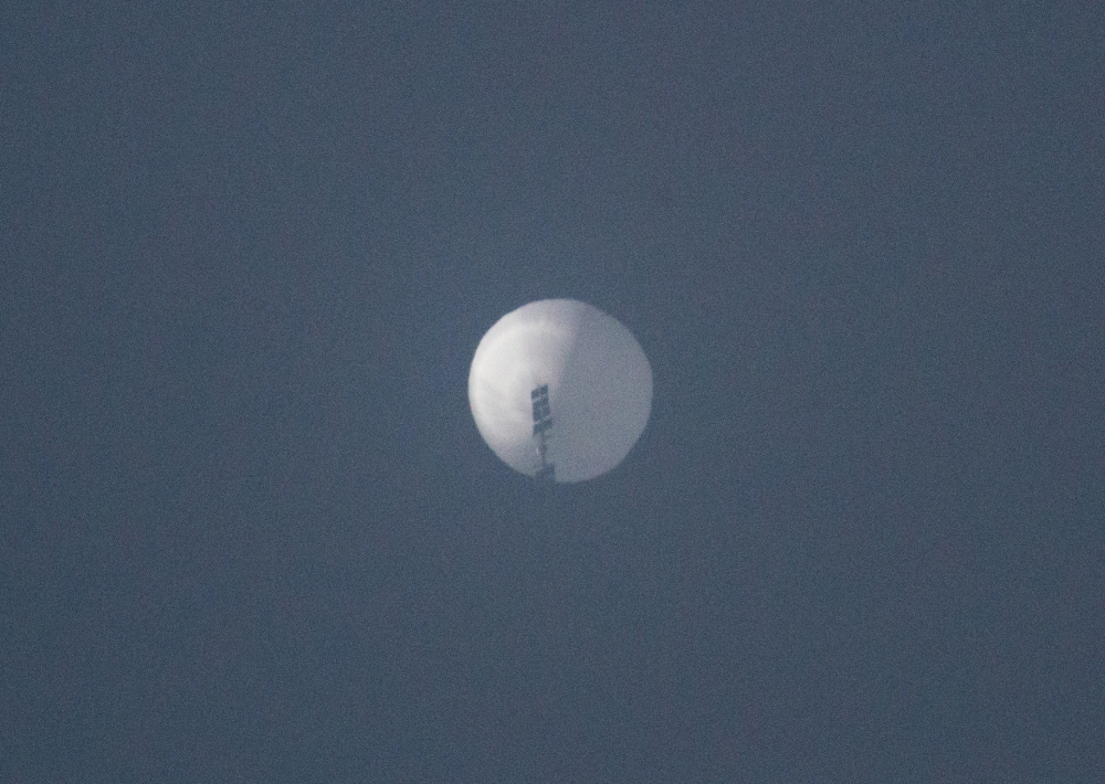 A balloon flies in the sky over Billings, Montana, US, February 1, 2023 in this picture obtained from social media. (Chase Doak/via Reuters)