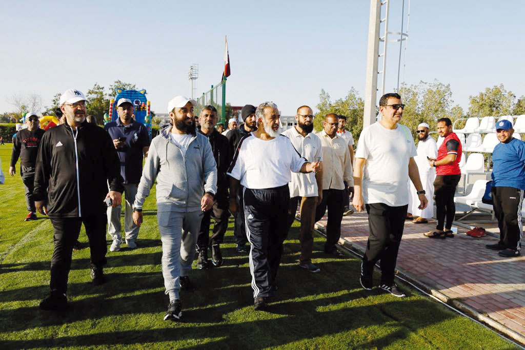 Minister of Awqaf and Islamic Affairs H E Ghanem bin Shaheen bin Ghanem Al Ghanem taking part in an activity organised by the Ministry at its playground in Abu Hamour.