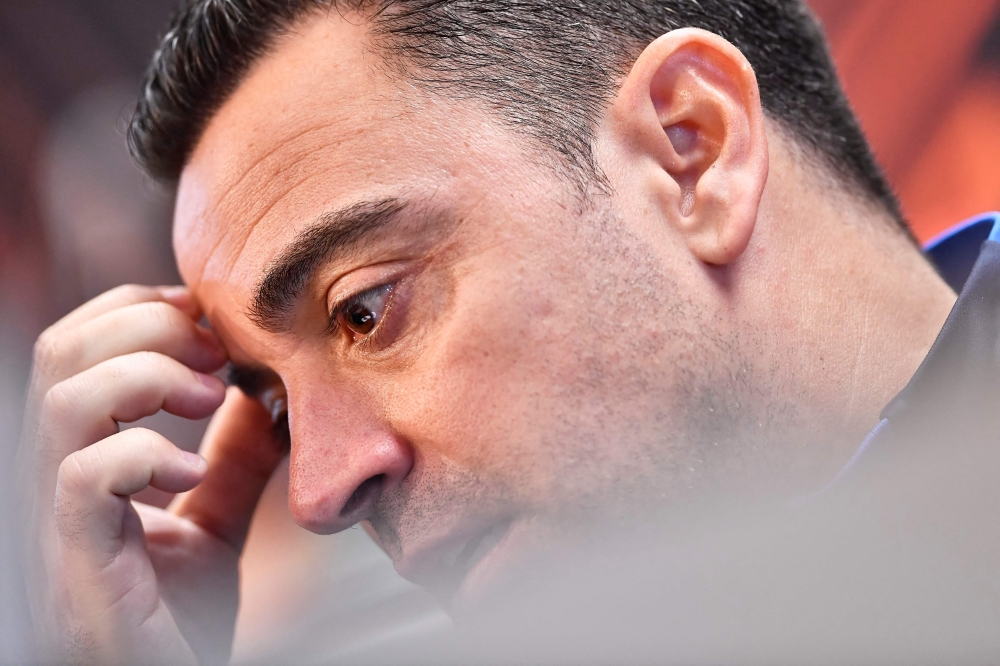 Barcelona's Spanish coach Xavi gives a press conference on the eve of their UEFA Europa League play-offs football match against Manchester United at the Joan Gamper training ground in Sant Joan Despi, near Barcelona, on February 15, 2023. (Photo by Pau BARRENA / AFP)
