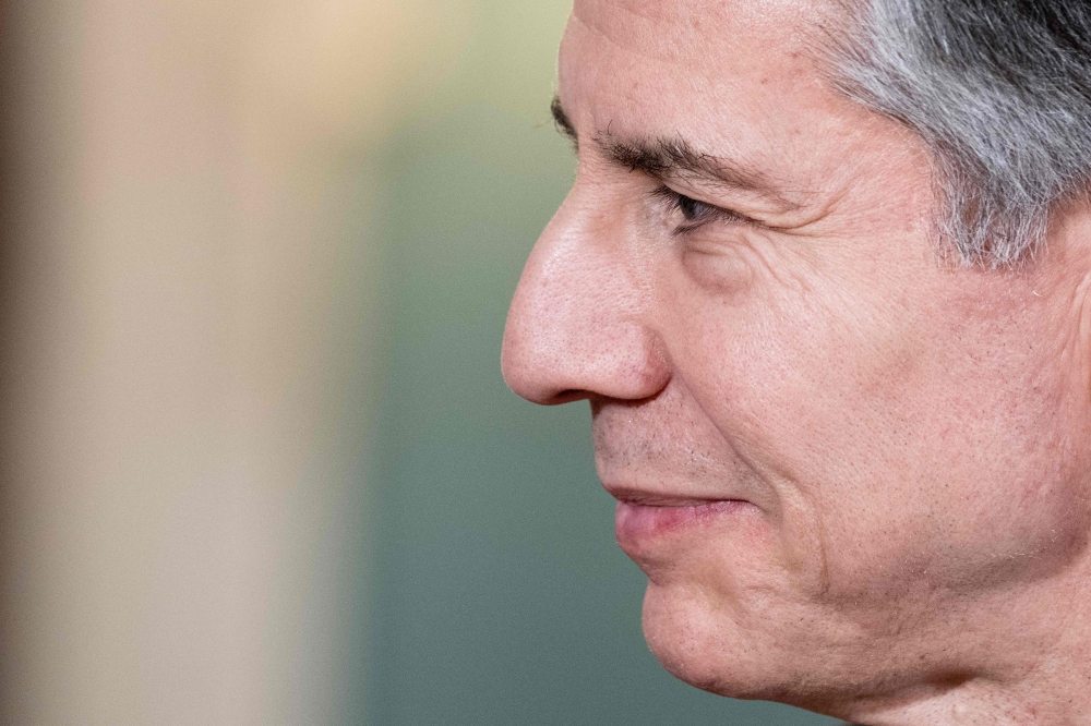 US Secretary of State Antony Blinken looks on during a meeting with Danish Foreign Minister Lars Lokke Rasmussen, not pictured, in the Treaty Room of the State Department in Washington, DC, on February 13, 2023. (Photo by Jim Watson / AFP)