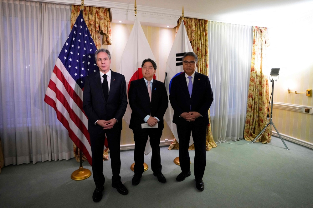 United States Secretary of State Antony Blinken, Japanese Foreign Minister Yoshimasa Hayashi and South Korea Foreign Minister Park Jin meet at the Munich Security Conference (MSC) in Munich, southern Germany, on February 18, 2023. (Photo by Petr David Josek / POOL / AFP)