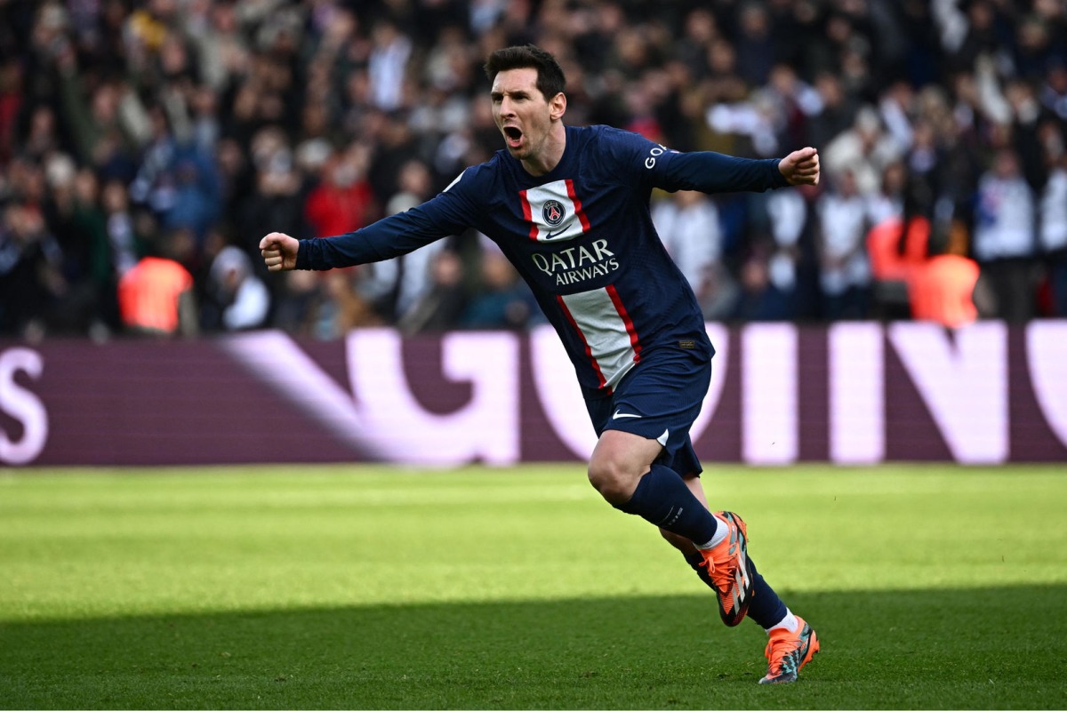 Paris Saint-Germain's Argentine forward Lionel Messi scored a 95th-minute free-kick to give PSG a 4-3 win over Lille LOSC at Ligue 1 match, The Parc des Princes Stadium in Paris on February 19, 2023. (Photo by ANNE-CHRISTINE POUJOULAT / AFP)