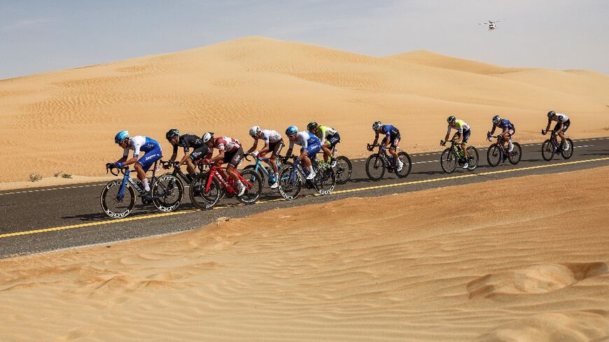 The peloton rides during the first stage of the UAE Tour - Giuseppe CACACE