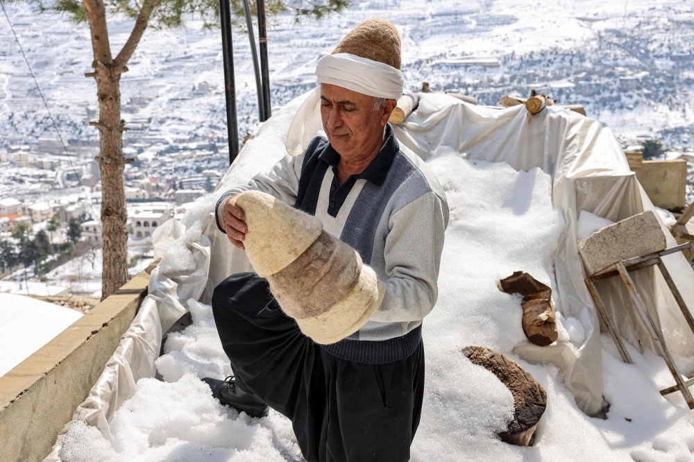 Hatmaker Youssef Akiki leaves his recently-finished Lebanese wool hats known as 