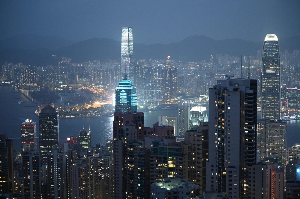 This photo taken on February 21, 2023 shows a view of buildings from the Peak in Hong Kong. Photo by Peter PARKS / AFP