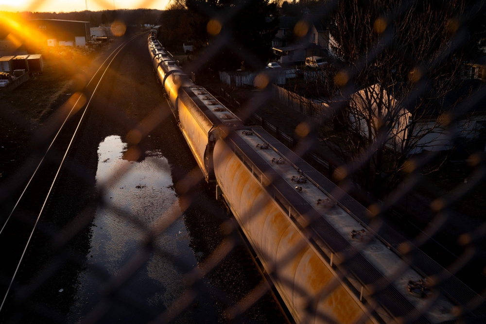 File photo: A Norfolk Southern train passes underneath a bridge on February 25, 2023 in East Palestine, Ohio. Michael Swensen/Getty Images/AFP.