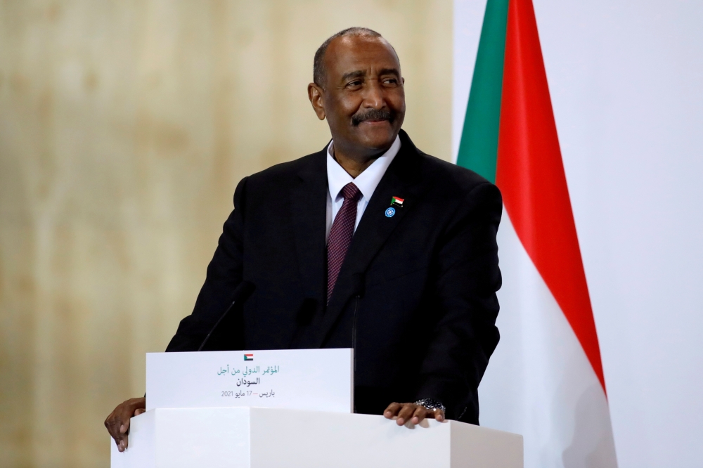 FILE PHOTO: General Abdel Fattah al-Burhan attends a news conference during the International Conference in support of Sudan at the Temporary Grand Palais in Paris, France, May 17, 2021. REUTERS/Sarah Meyssonnier

