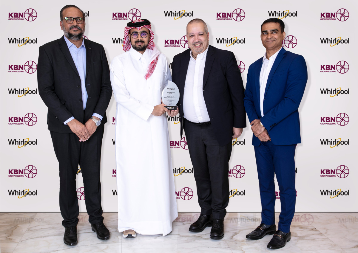 Sheikh Abdulla Bin Khalid Nasser Hamad Al Thani (second from left) receives the award from Mourad Alem (second from right) in the presence of Pradeesh Kumar, General Manager - KBN Group Holding (left) and Rajesh Balachandran, Regional Sales Manager, Whirlpool Corporation - Middle East (right).
