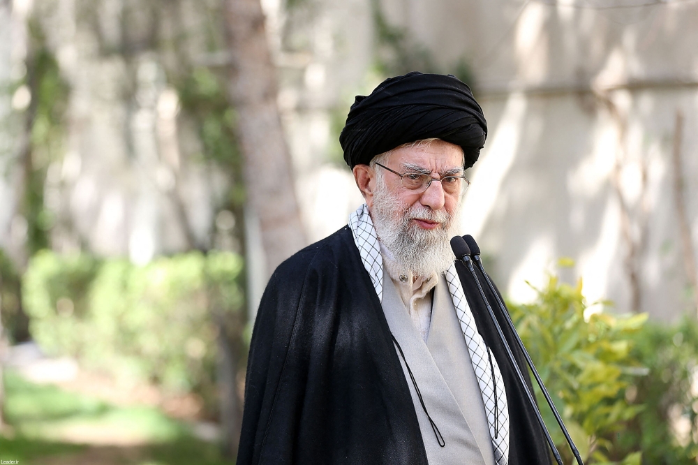 A handout picture provided by the office of Iran's Supreme Leader Ayatollah Ali Khamenei on March 6, 2023 shows him speaking following a ceremony marking the week of 