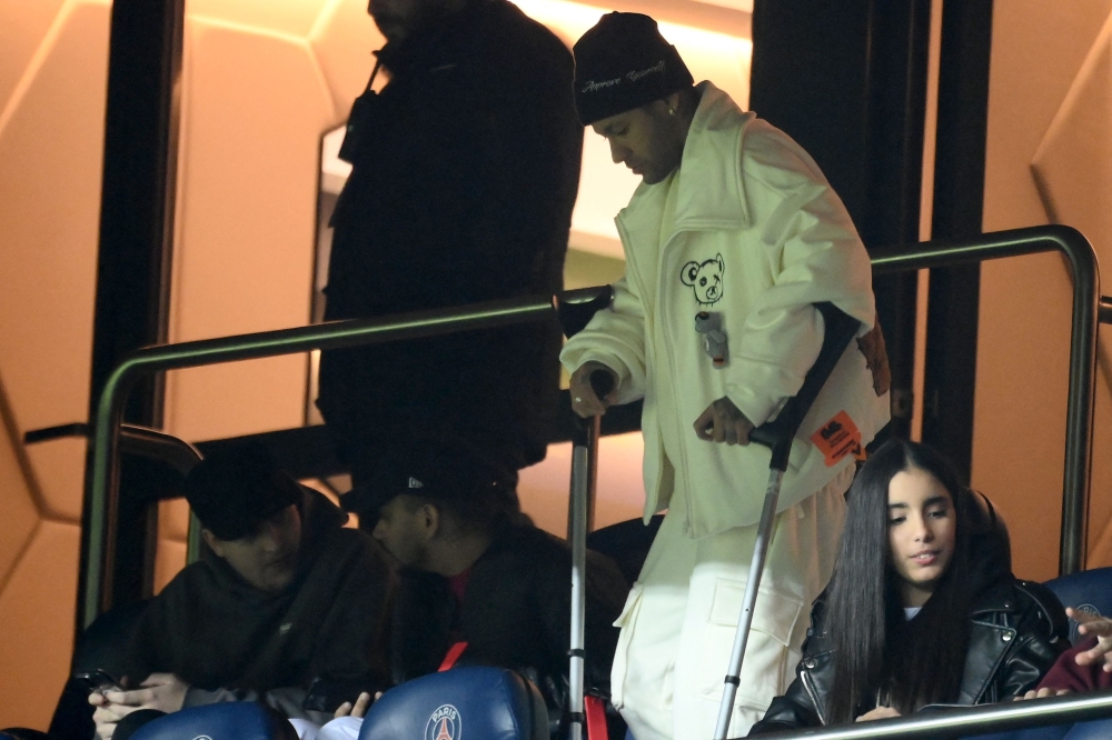 In this file photo taken on March 04, 2023 Paris Saint-Germain's Brazilian forward Neymar uses crutches as he takes a seat in the stand during the French L1 match between Paris Saint-Germain (PSG) and FC Nantes at The Parc des Princes Stadium in Paris.  (Photo by FRANCK FIFE / AFP)
 