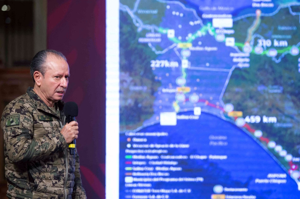 Handout picture released by the Mexican Presidency showing the Secretary of the Mexican Navy, Jose Rafael Ojeda, speaking during a press conference on the kidnapping of four US citizens, two who have been killed, in the border city of Matamoros, State of Tamaulipas, at the National Palace in Mexico City, on March 7, 2023. (Photo by Mexican Presidency / AFP)