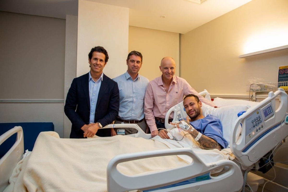 From left: Brazilian surgeon and national team doctor Rodrigo Lasmar, Aspetar's Chief Medical Officer Dr. Pieter D'Hooghe, ankle surgeon Dr. Pierre James Calder, and Paris Saint-Germain's Brazilian forward Neymar da Silva Santos Junior after undergoing surgery at Aspetar in Doha, Qatar, on Friday.