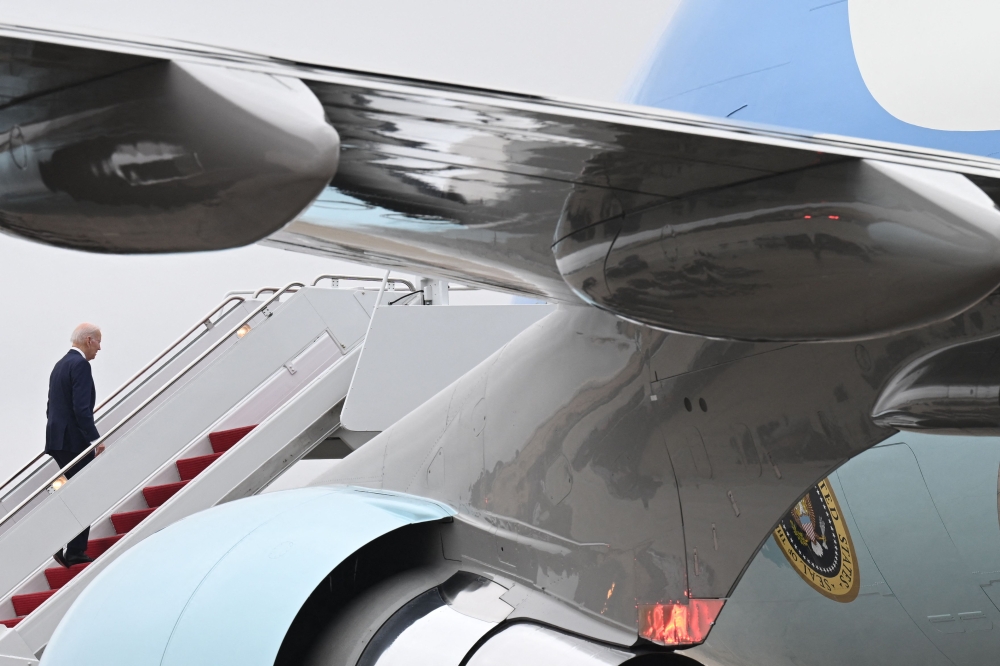 US President Joe Biden boards Air Force One on March 13, 2023 at Joint Base Andrews in Maryland. (Photo by Saul Loeb / AFP)