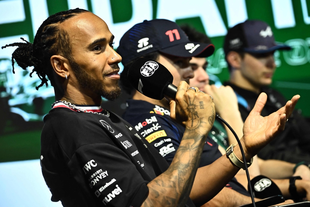 Mercedes' British driver Lewis Hamilton speaks during a press conference at the Jeddah Corniche Circuit on March 16, 2023, ahead of the 2023 Saudi Arabia Formula One Grand Prix. (Photo by Ben Stansall / AFP)