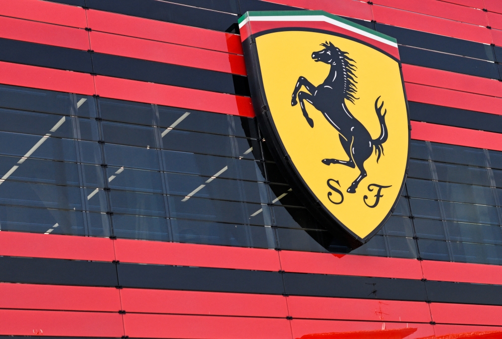 The logo of Ferrari is seen in the headquarters as CEO Benedetto Vigna unveils the company's new long term strategy, in Maranello, Italy, June 15, 2022. Picture taken June 15, 2022. REUTERS/Flavio Lo Scalzo

